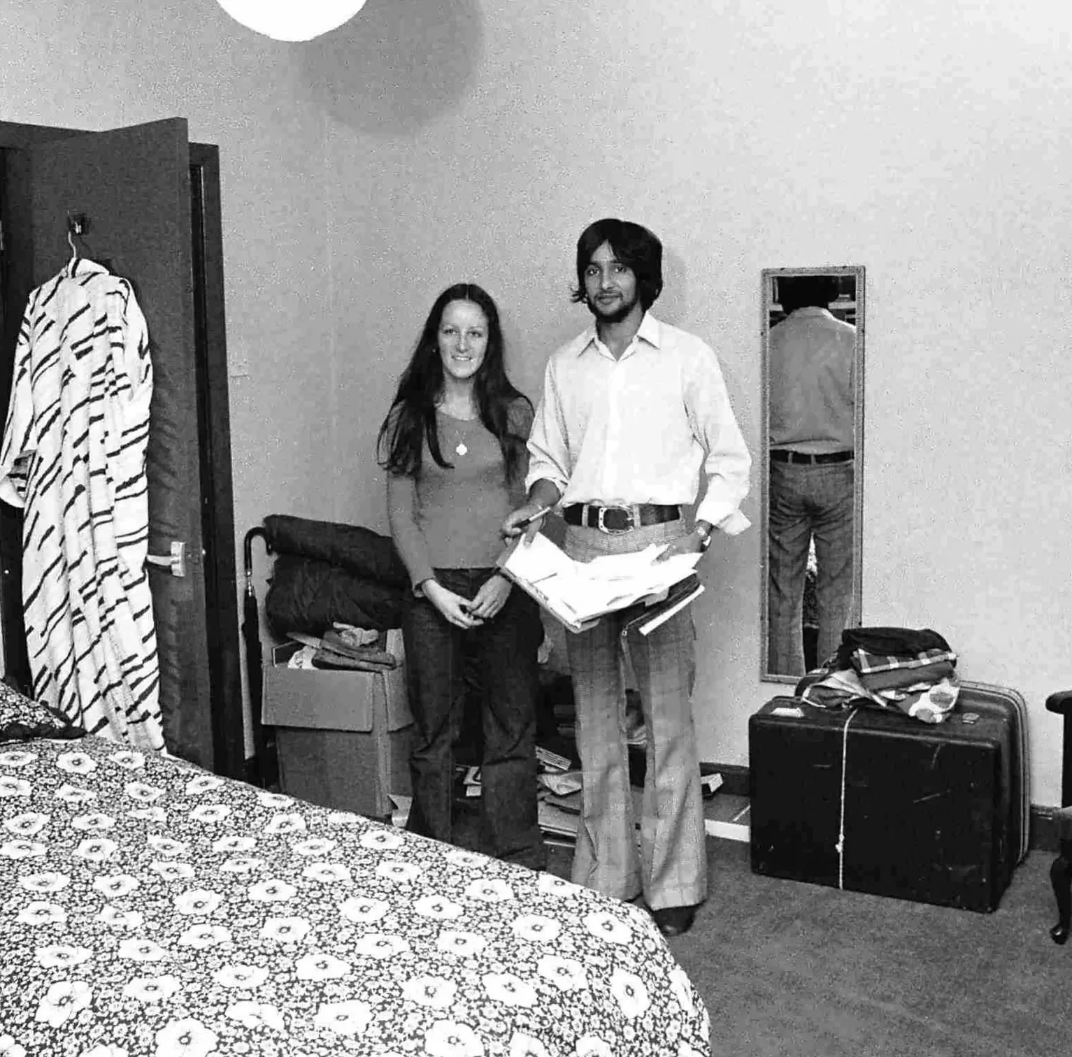 Early John Winter tenants moving into their room, 1975